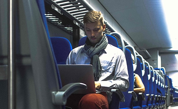 man traveling with laptop