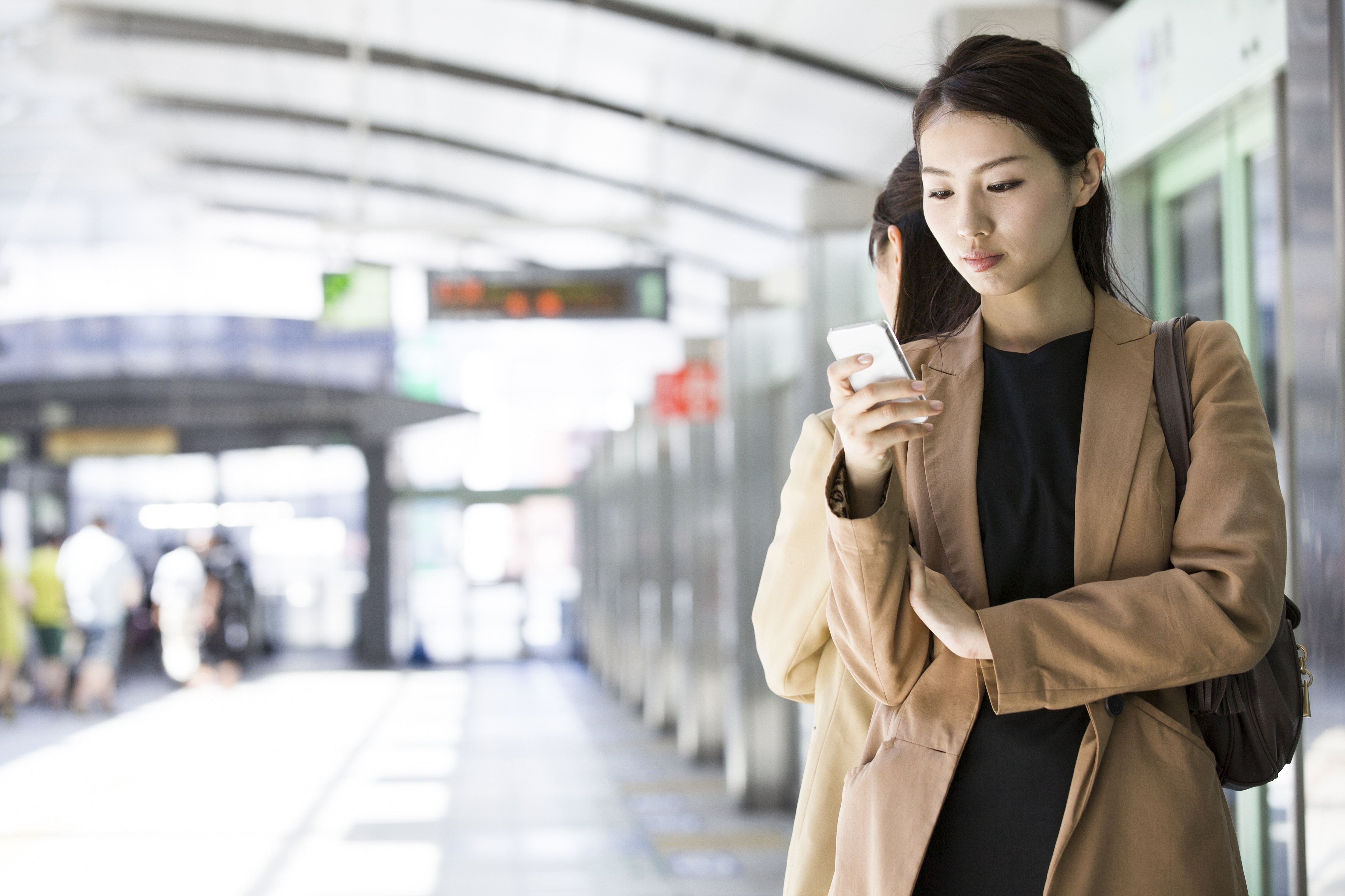 asian women business traveler, business professional, train station