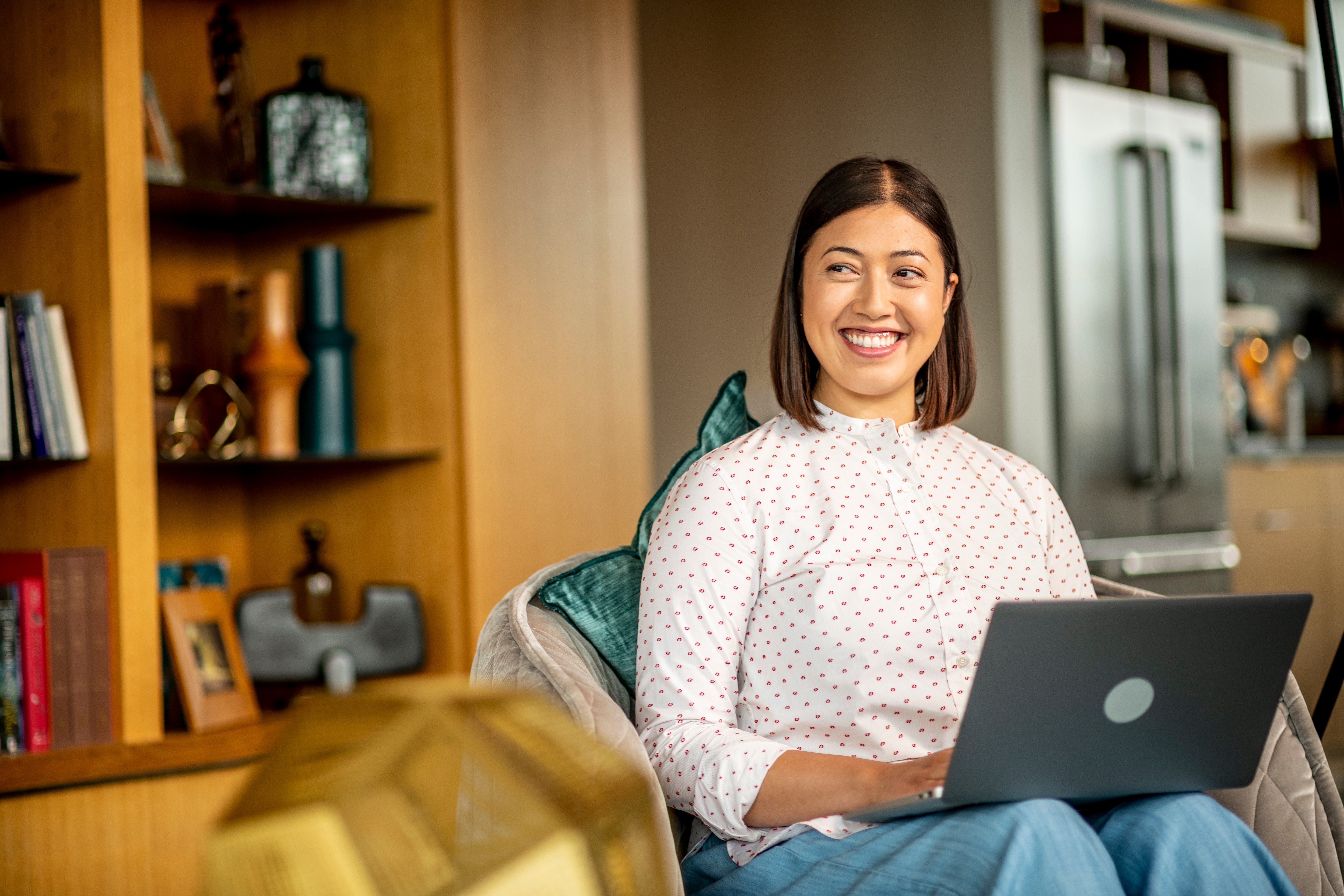 Meet Sasha a finance manager - asian women smiling