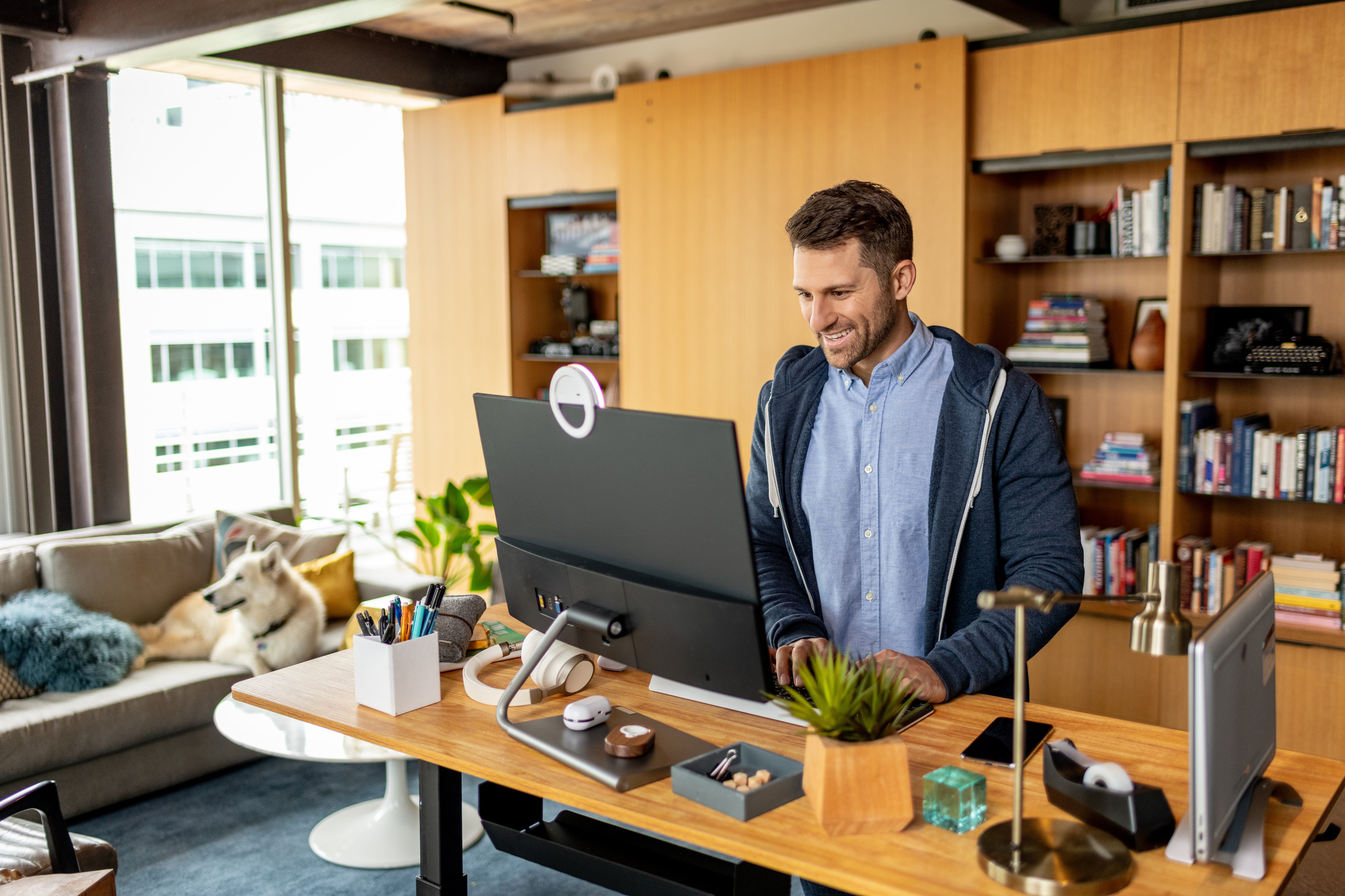 person working at standing desk