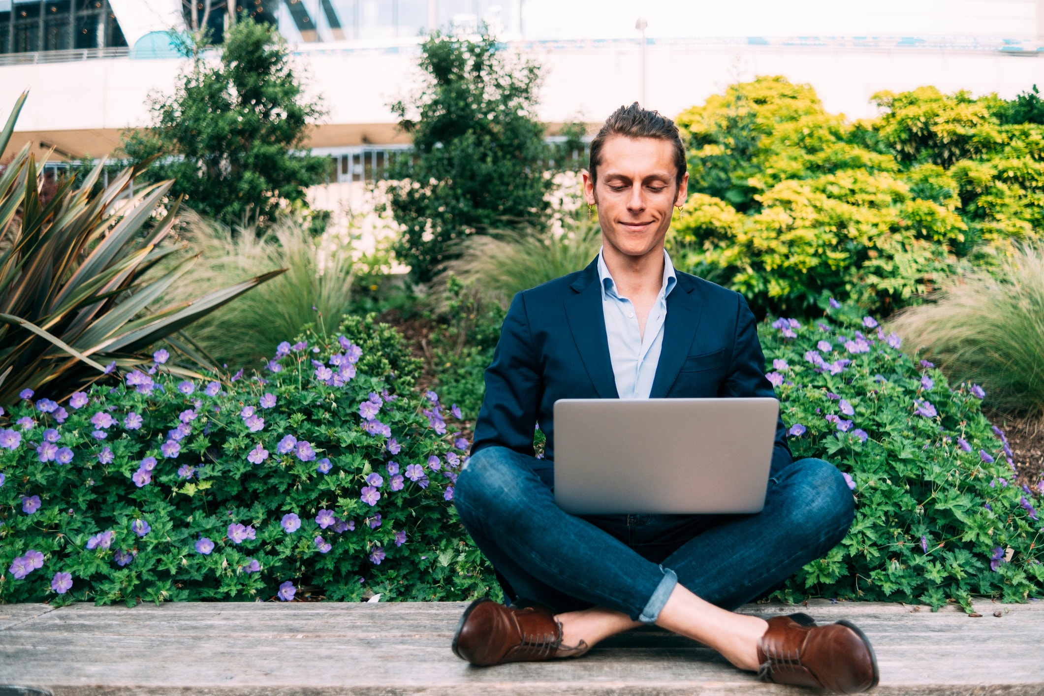 man sitting with computer 