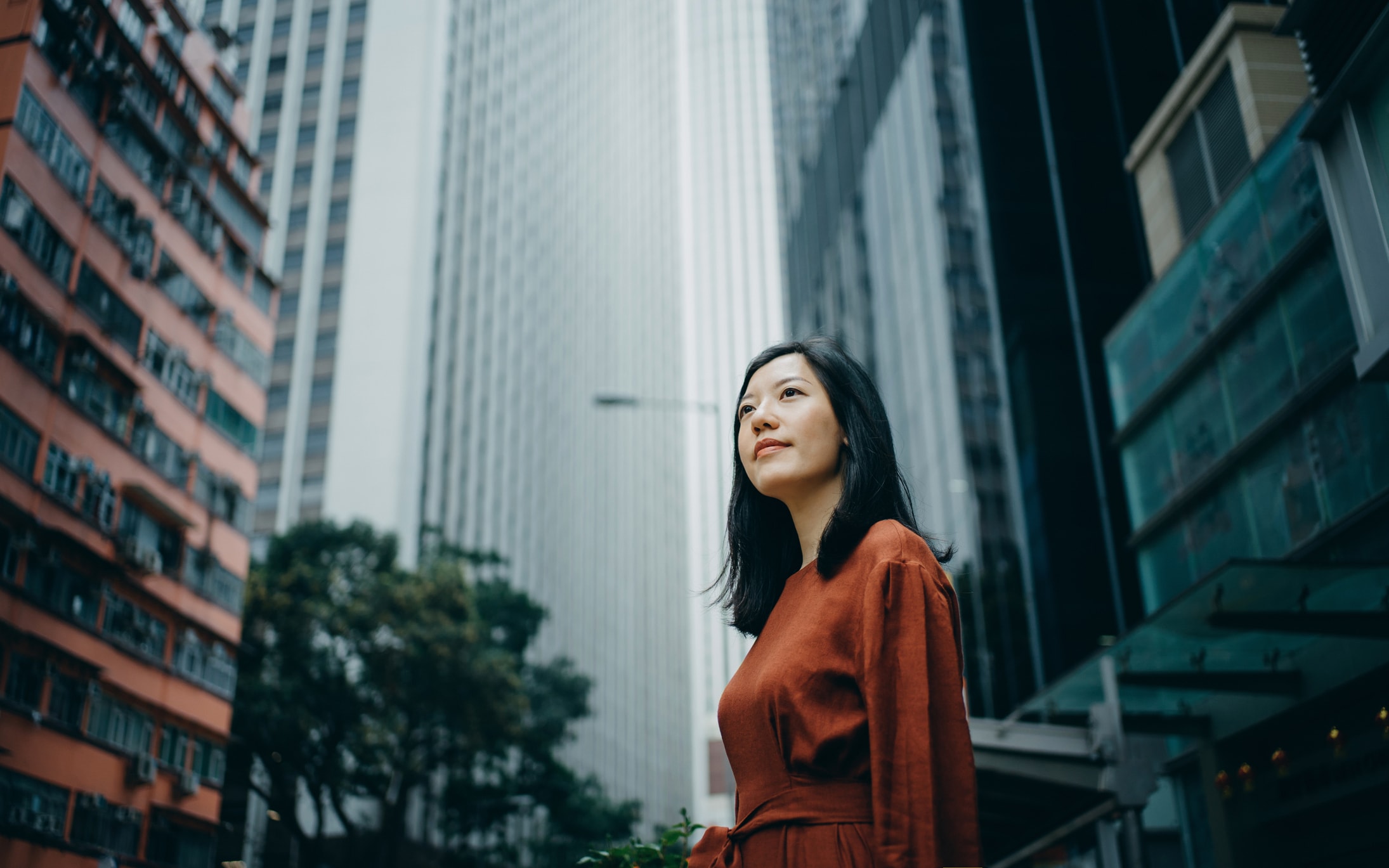 a business woman outside the office building 