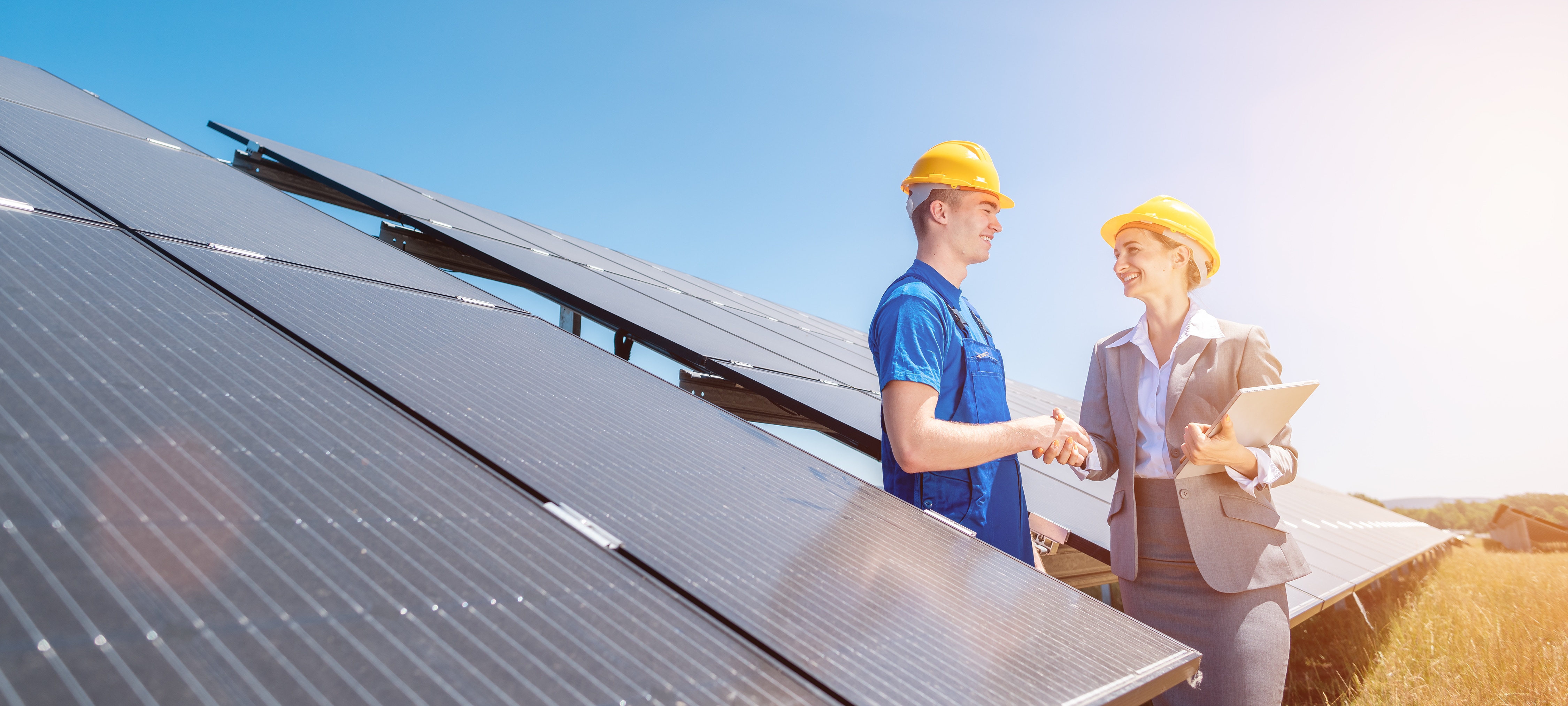 Construction workers shaking hands