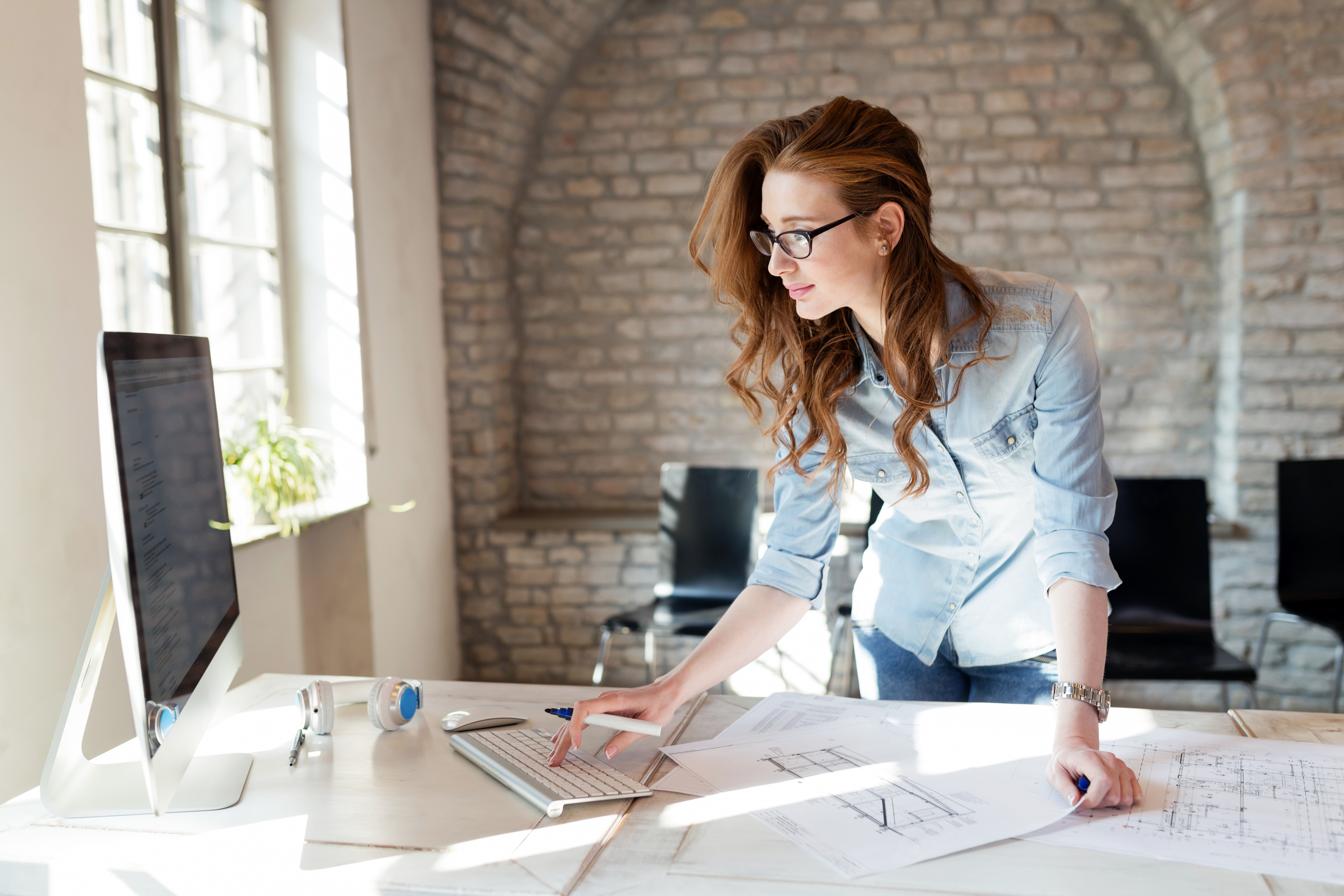 person working on plans