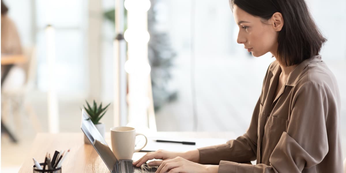 woman working with laptop at modern office