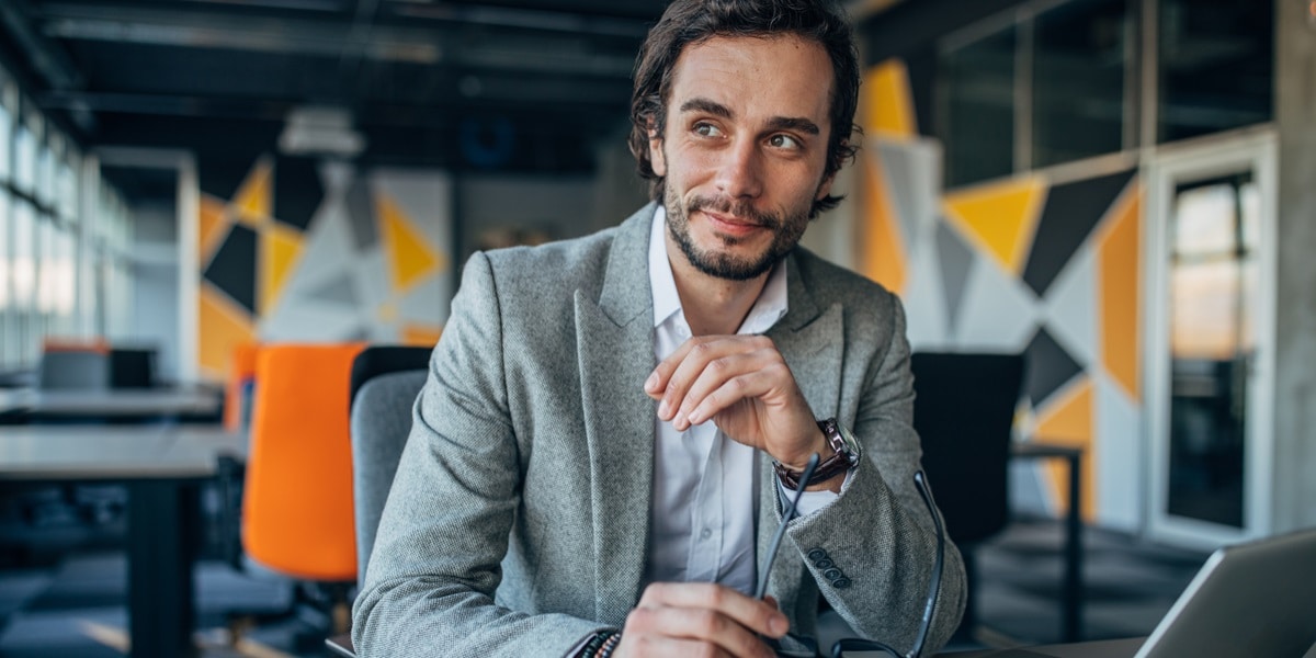 A CFO or Finance leader working on a computer